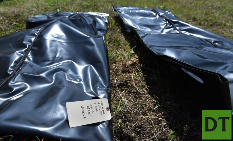 В братской могиле в Снежном нашли останки 10 жертв ВСУ