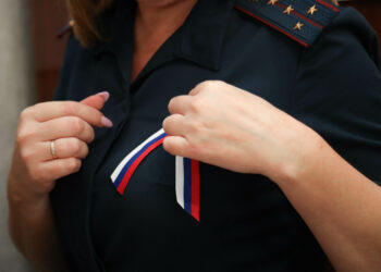 В ГУФСИН России по ДНР отметили День флага России патриотической акцией